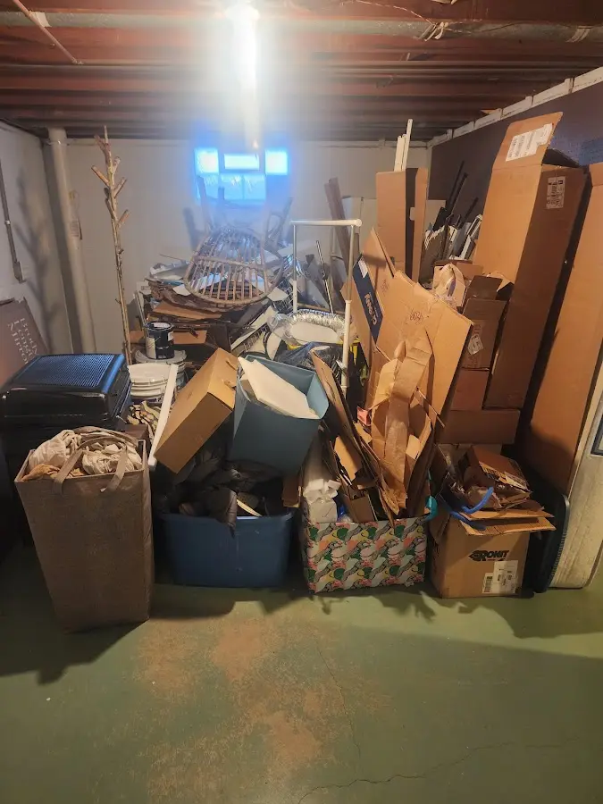 Roll-off dumpster container at job site for 20 Yard Dumpster Rental in Hampden